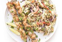 Flavorful Whole30 Keto Thai Chicken Satay Skewers with Crisp Coleslaw