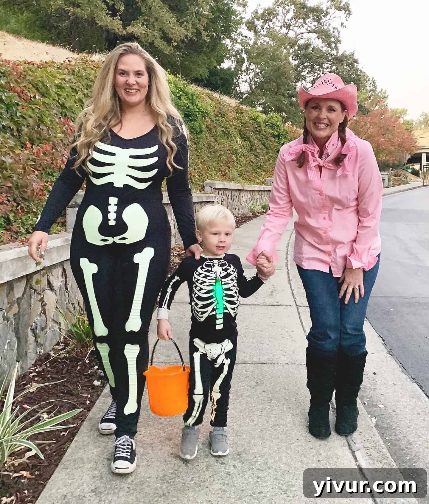 Autumn's Coffee & Chats 8 Joyful family in glow-in-the-dark skeleton outfits during Halloween night