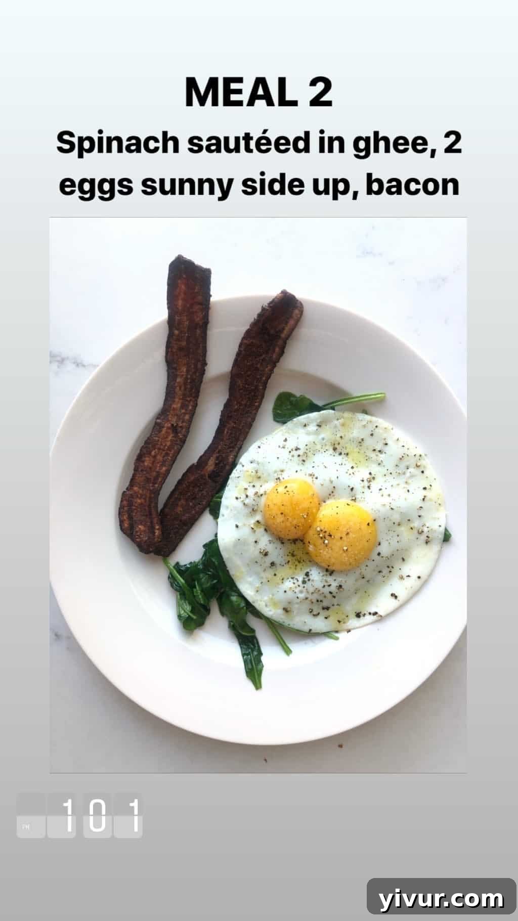 My October Clean Keto Whole30 Food Diary 2019 81 A breakfast plate with sauteed spinach, sunny-side-up eggs, and crispy bacon.