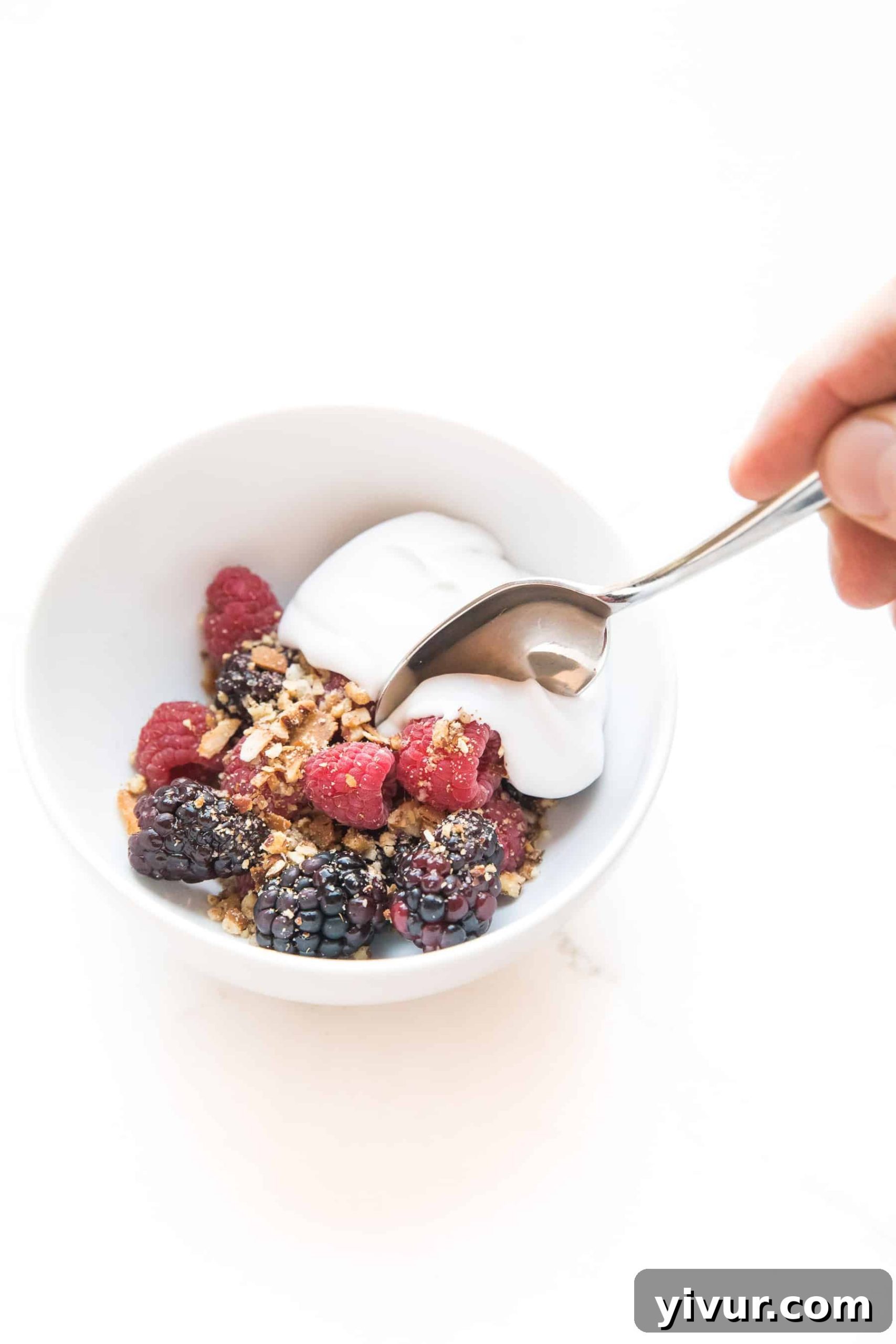 Whole30 Keto No-Bake Berry Delight 3 whole30 + keto raw berry crisp: raspberries + blackberries topped with pecan + shredded coconut with coconut whipped cream