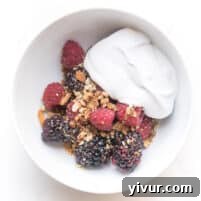 Whole30 Keto No-Bake Berry Delight 6 whole30 + keto raw berry crisp: raspberries + blackberries topped with pecan + shredded coconut with coconut whipped cream