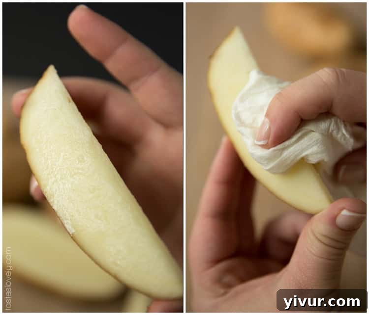 Perfectly Roasted Potato Wedges 5 A cutting board with sliced potato halves, demonstrating the correct method for preparing wedges