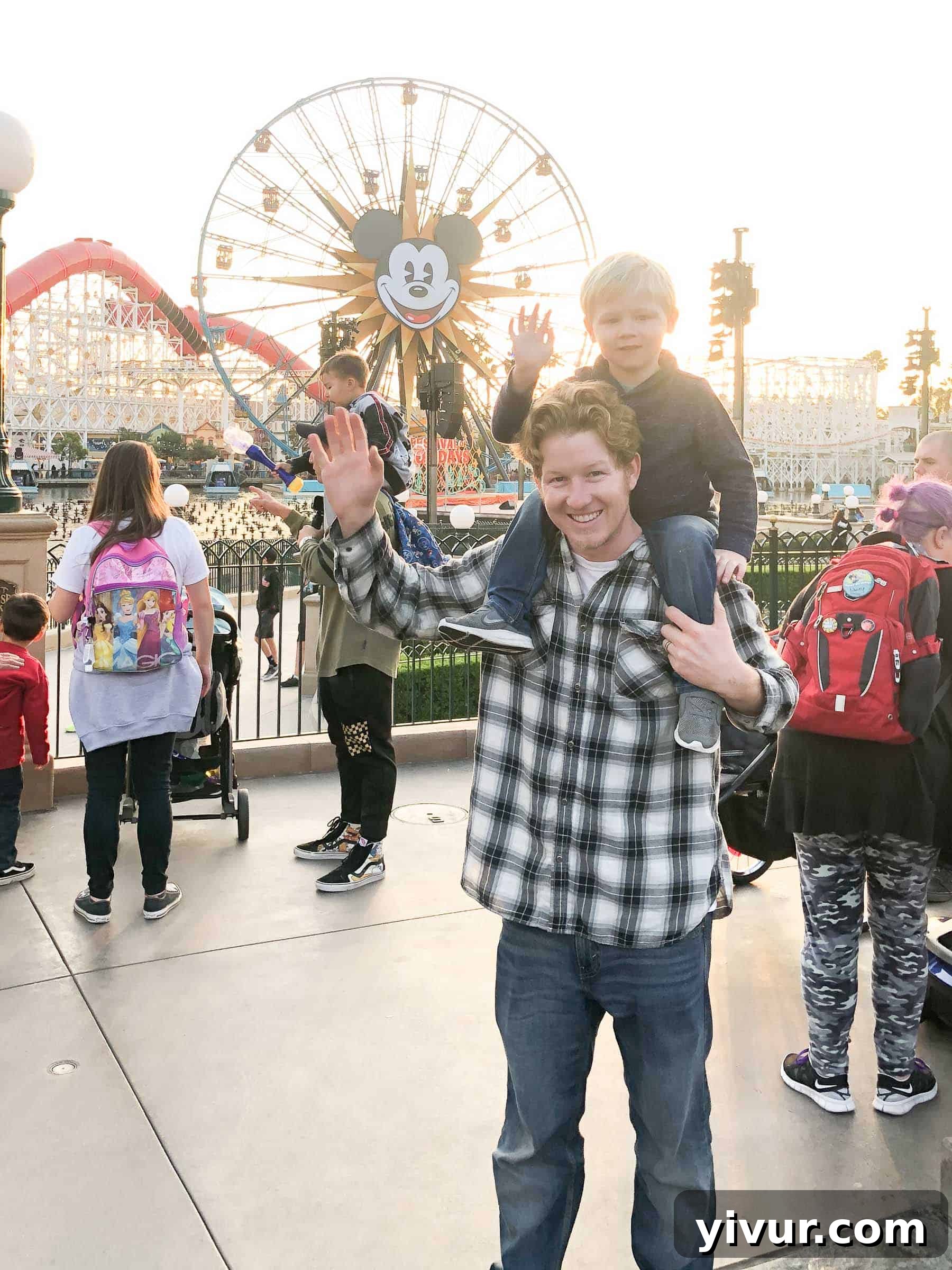 Family enjoying a parade at Disneyland