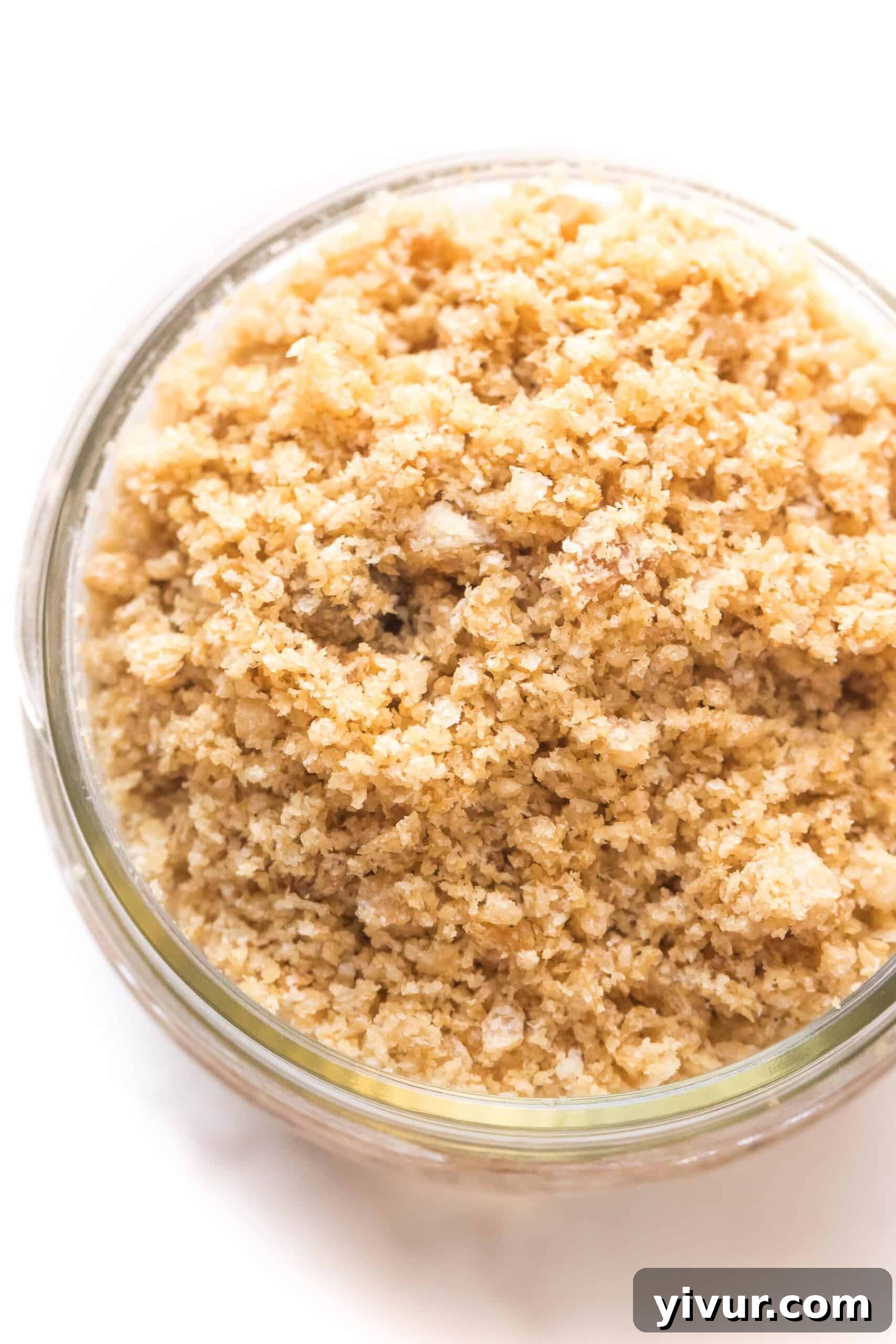 Homemade pork panko stored in a mason jar on a kitchen counter, highlighting its light, fluffy texture.