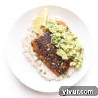 whole30 + keto blackened salmon over cauliflower risotto with chunky avocado topping