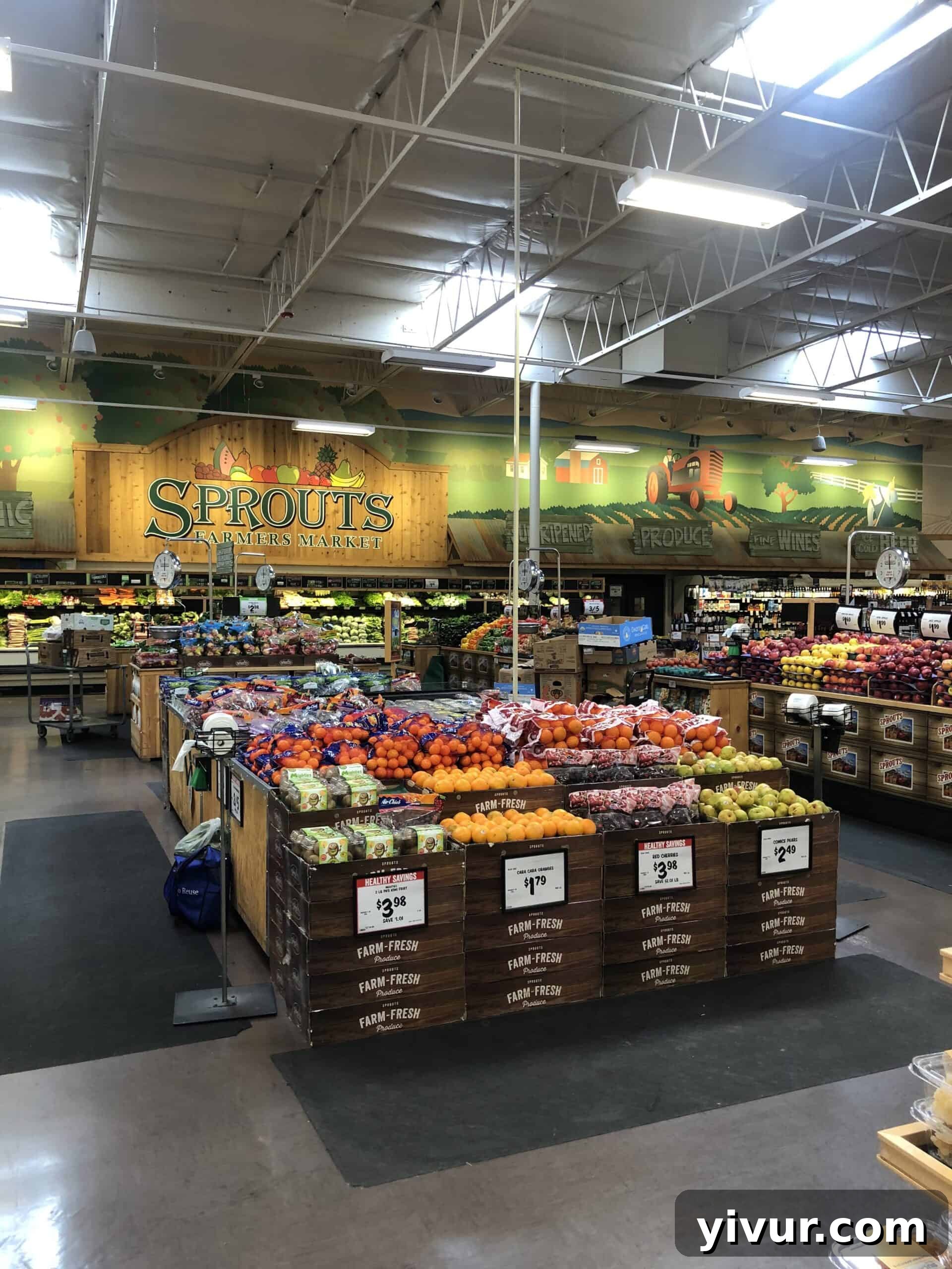 Vibrant and fresh produce displays at Sprouts grocery store, showcasing a wide variety of organic fruits and vegetables.