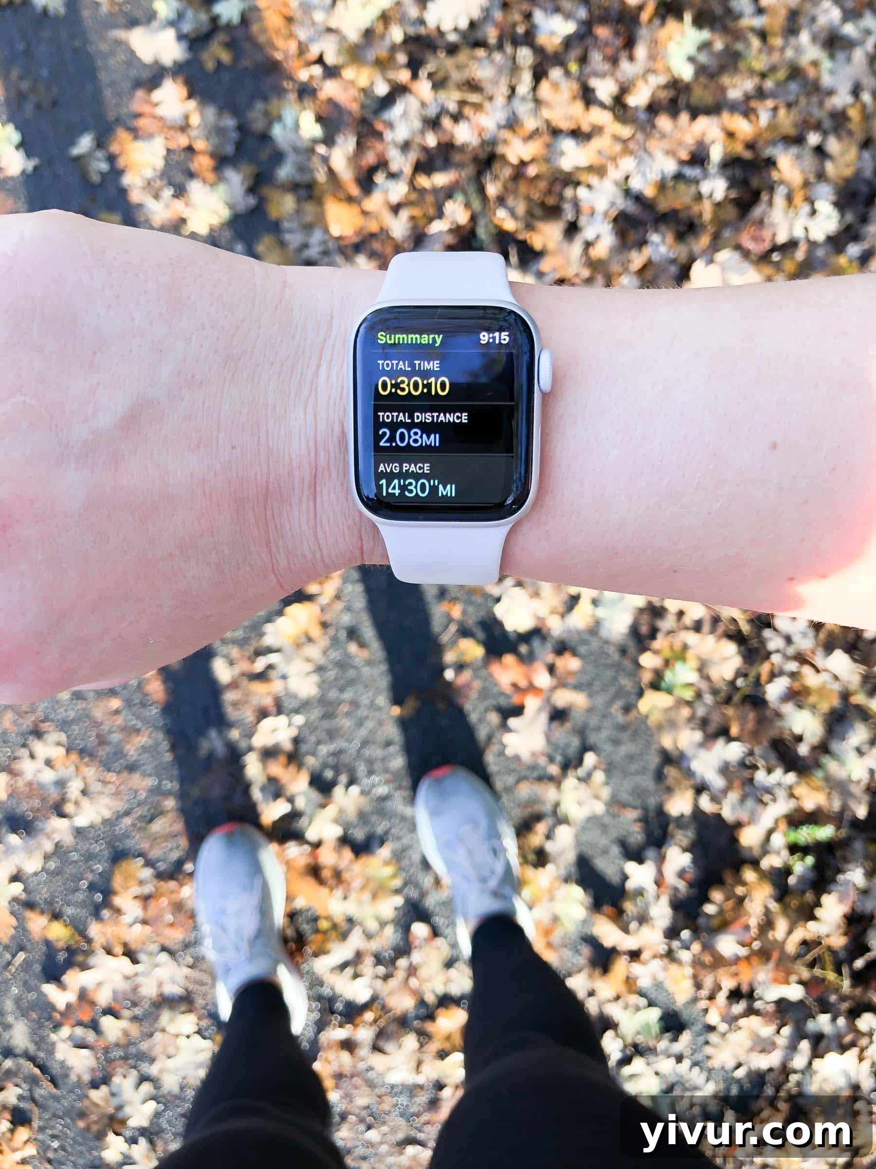 A woman smiling after a successful solo jog, dressed in athletic wear.
