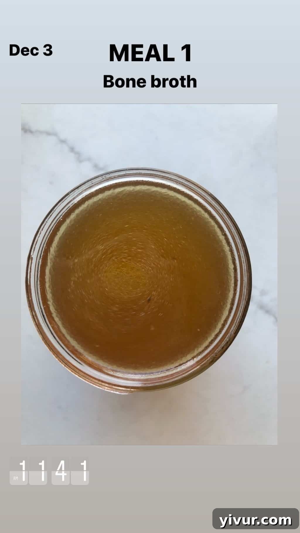 December 2019 Clean Keto and Whole30 Food Diary 11 A simple, clear glass of bone broth, highlighting its pure, nourishing qualities for a healthy diet.