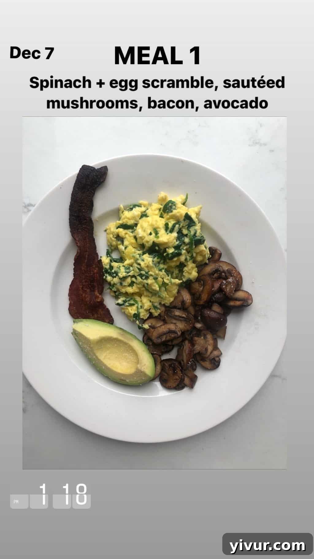 December 2019 Clean Keto and Whole30 Food Diary 22 A nutrient-packed breakfast plate featuring a spinach and egg scramble, sautéed mushrooms, crispy bacon, and creamy sliced avocado.