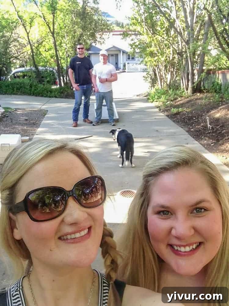 Friends playing Cornhole outdoors, a classic summer game