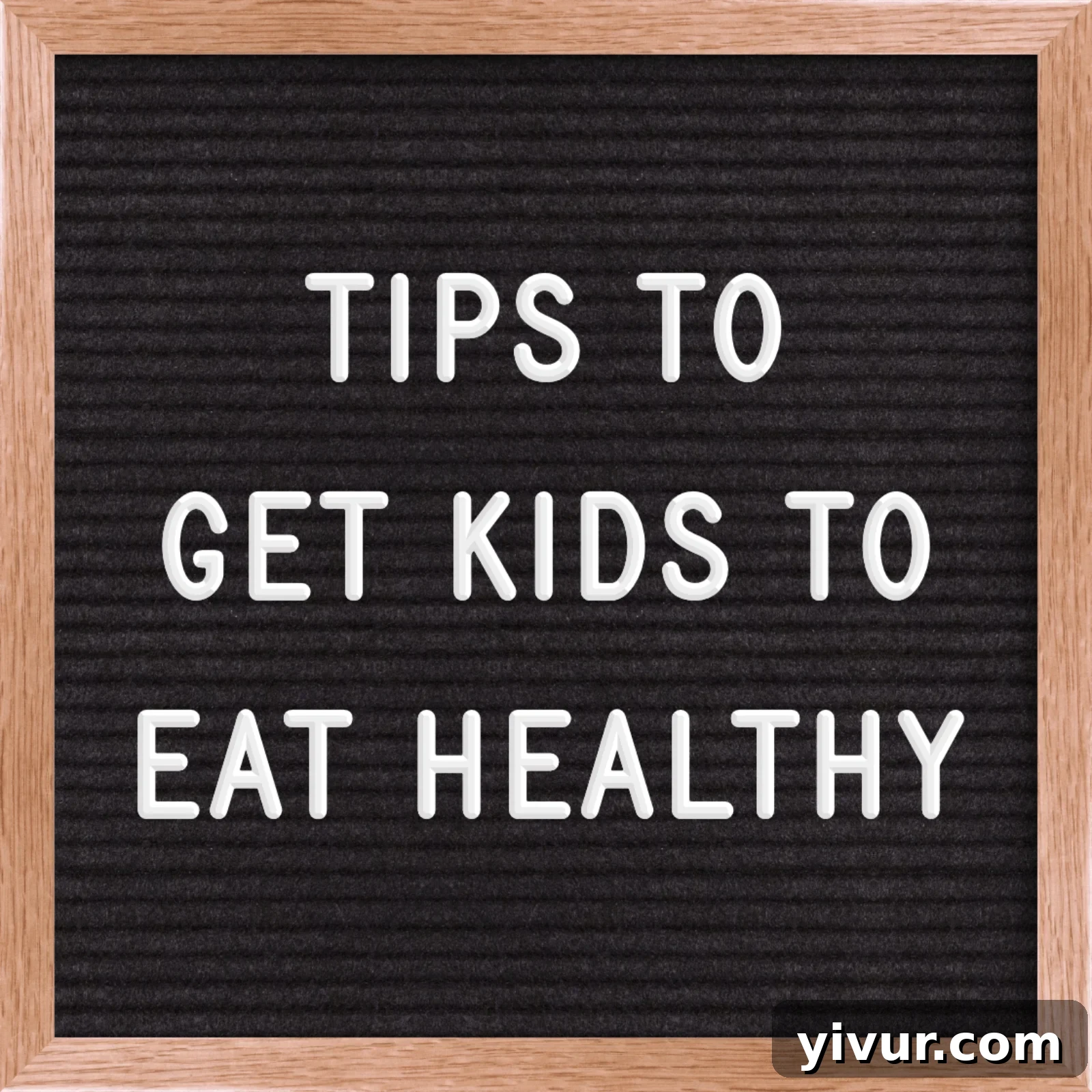 A letterboard sign displaying 'TIPS TO GET KIDS TO EAT HEALTHY' with fresh produce in the background, symbolizing a focus on children's nutrition and healthy eating strategies.