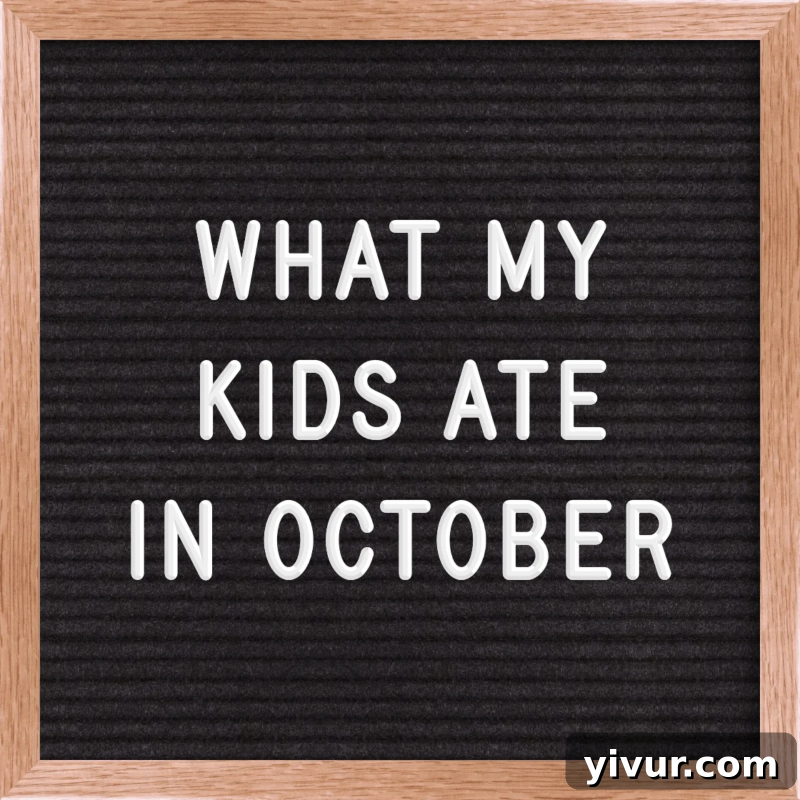 Letterboard sign displaying 'What My Kids Ate in October 2019' with colorful autumn decorations, highlighting healthy eating for children