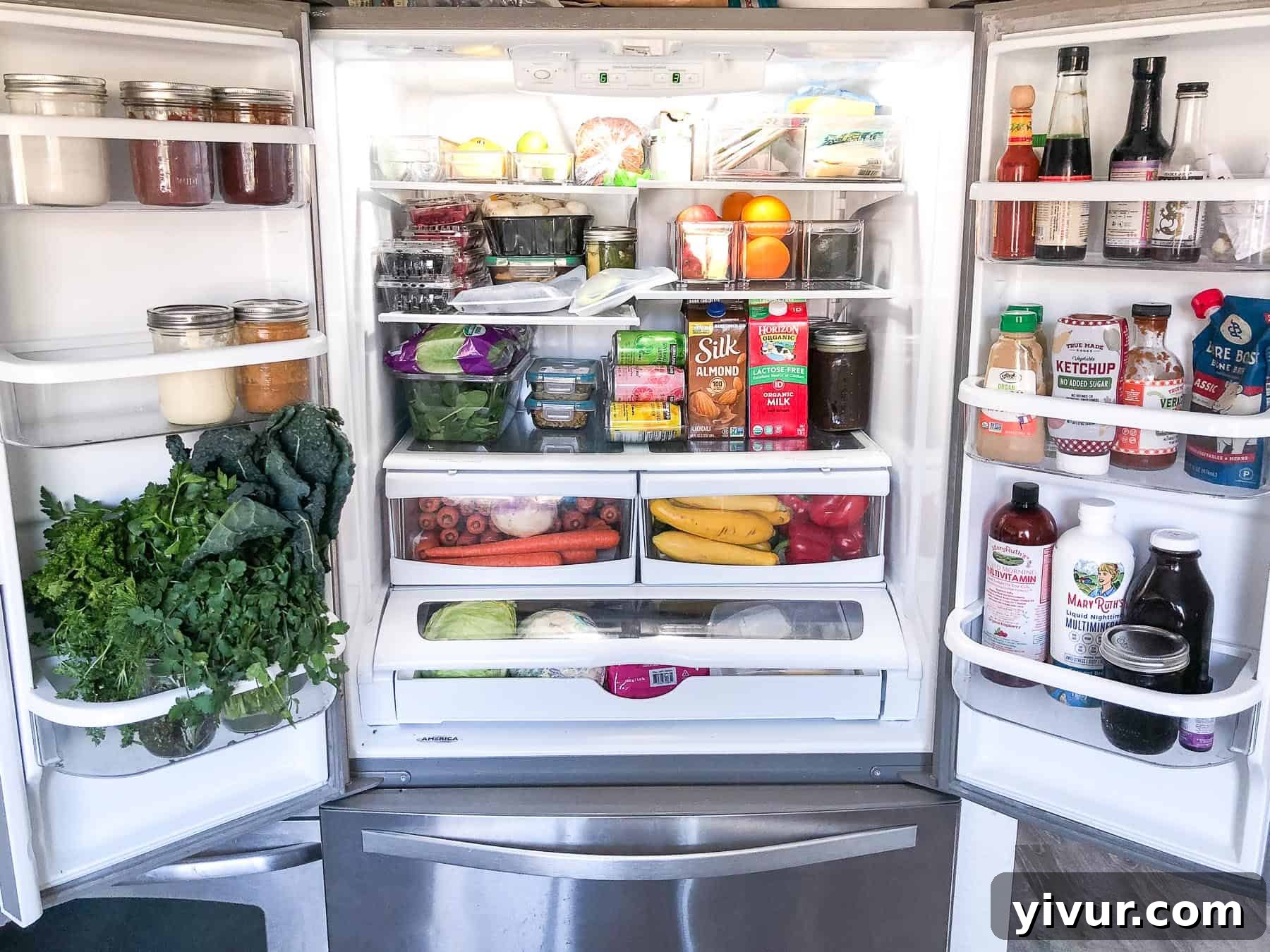 A meticulously organized Whole30 and Keto stocked refrigerator, showcasing prepped meals, fresh produce, and healthy staples.