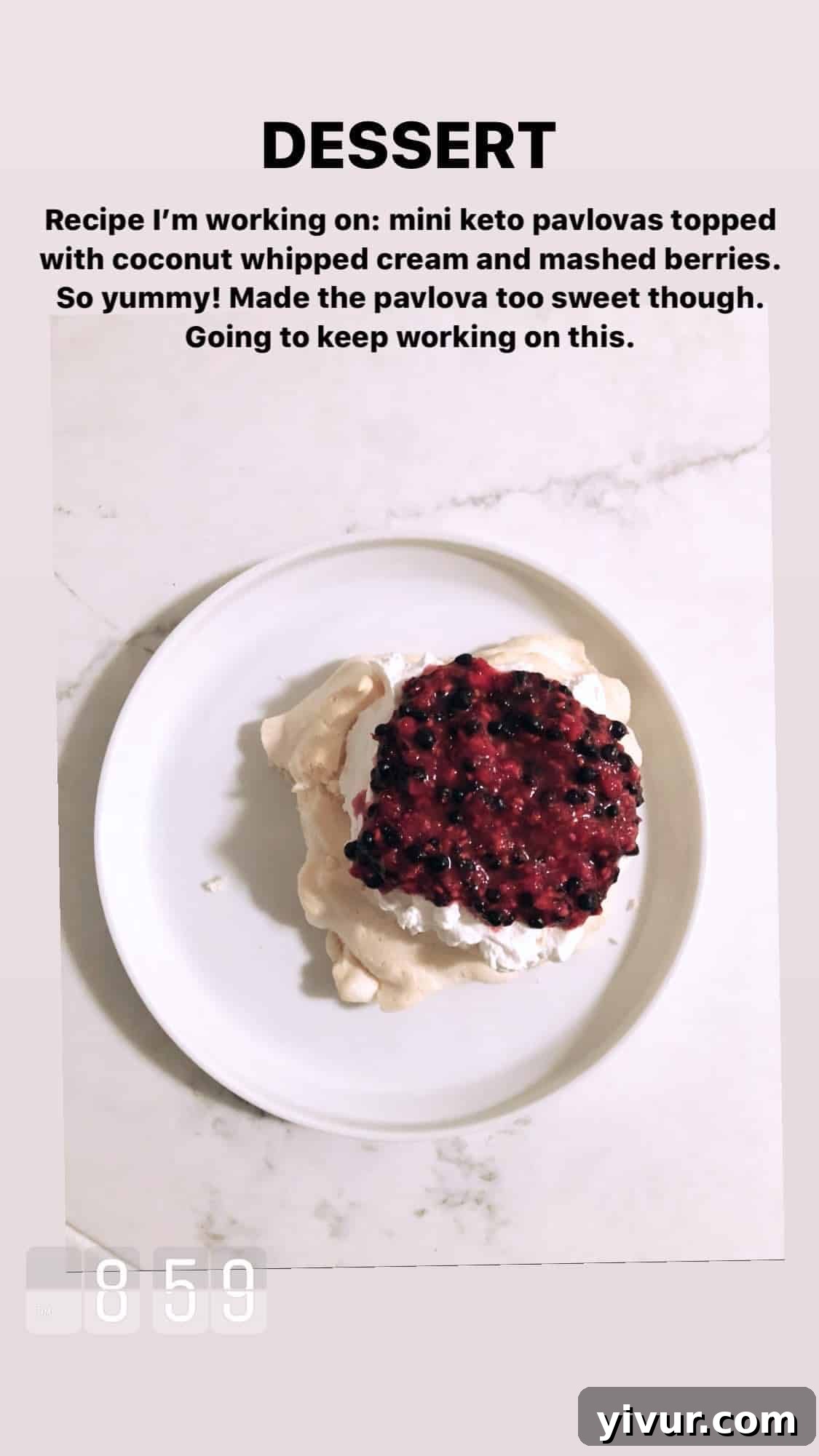Mini keto pavlova with coconut whipped cream and mashed berries - a delicate low-carb dessert
