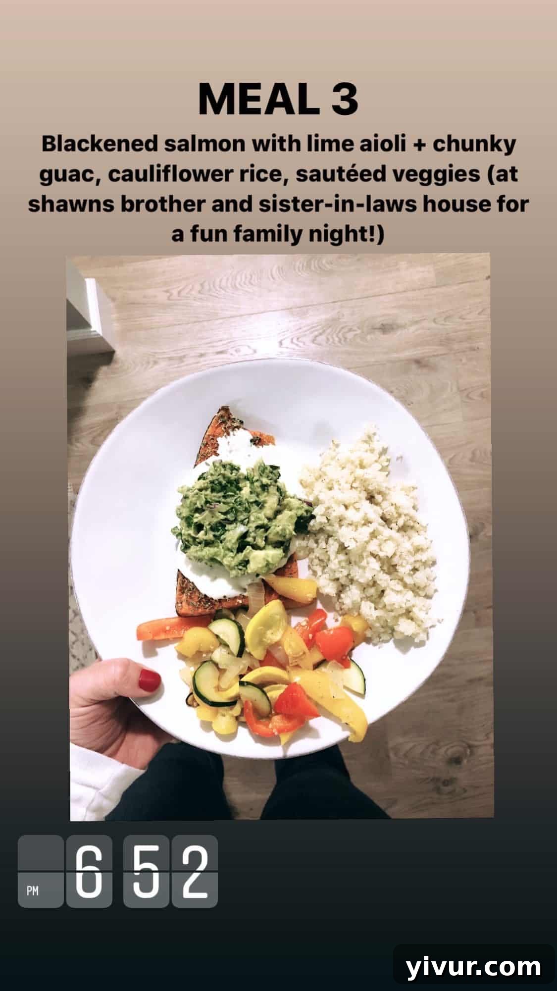 Blackened salmon with lime aioli, guacamole, cauliflower rice, and sauteed vegetables - a healthy and flavorful seafood dinner