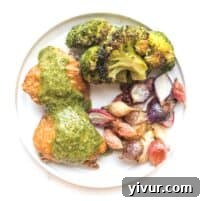 Close-up of crispy chicken thighs with orange parsley sauce
