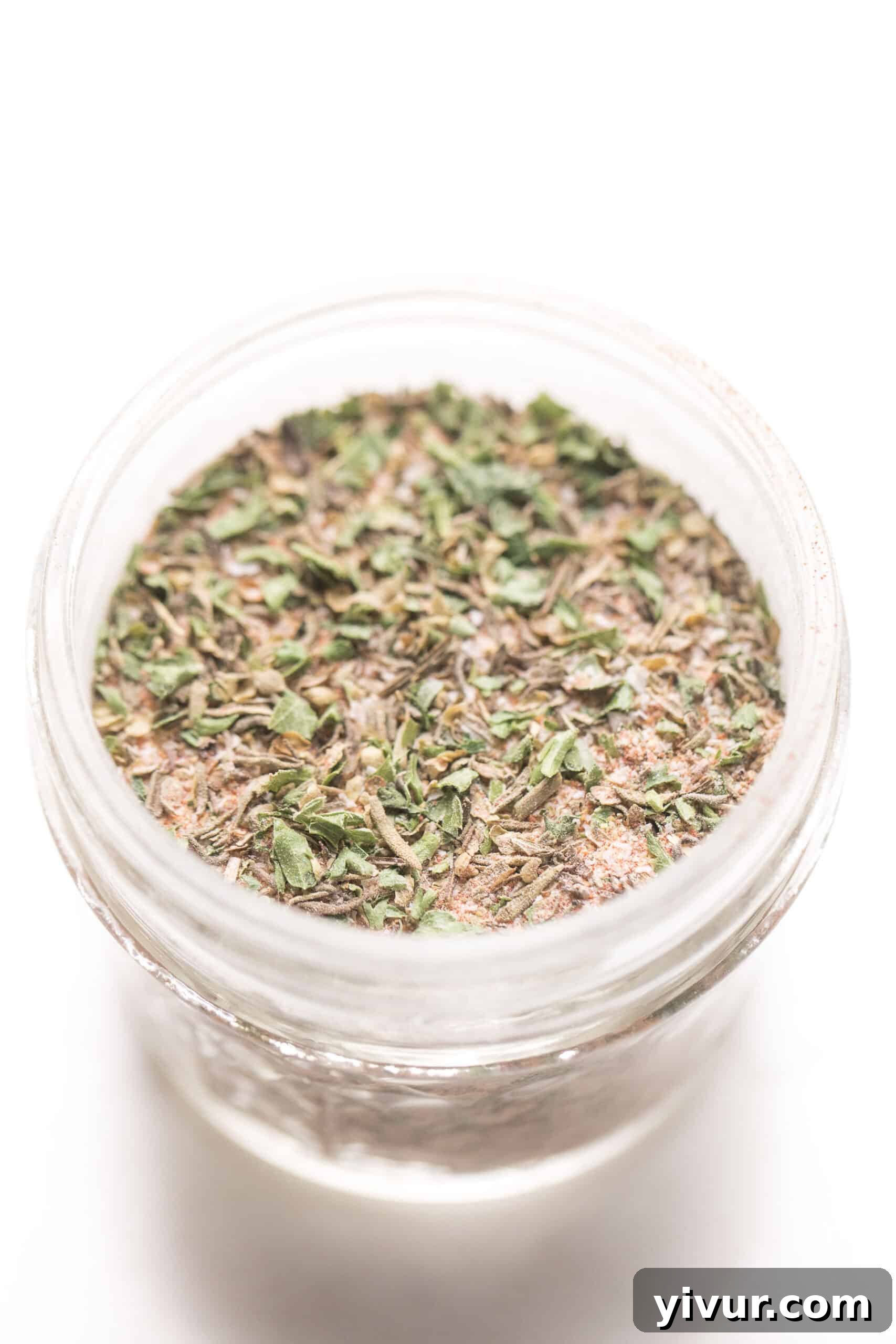 Homemade blackened seasoning in a mason jar, ready for use in Whole30 and Keto dishes.