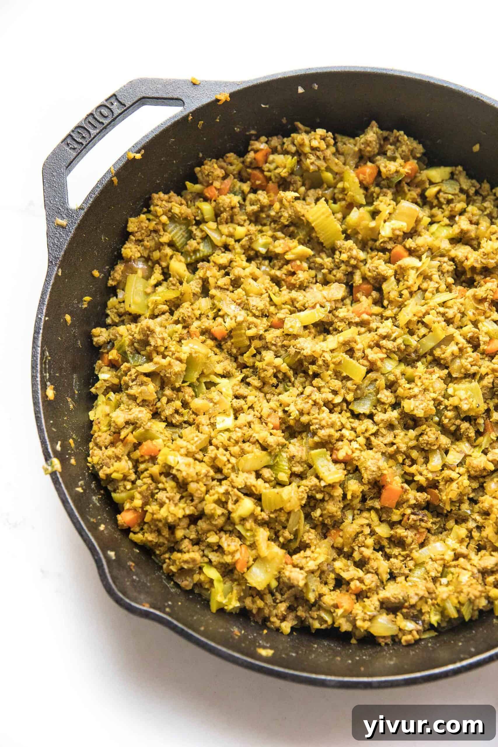 Curry lettuce wraps filling in a cast iron skillet