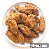 A plate of perfectly grilled Whole30 and Keto BBQ Chicken Wings