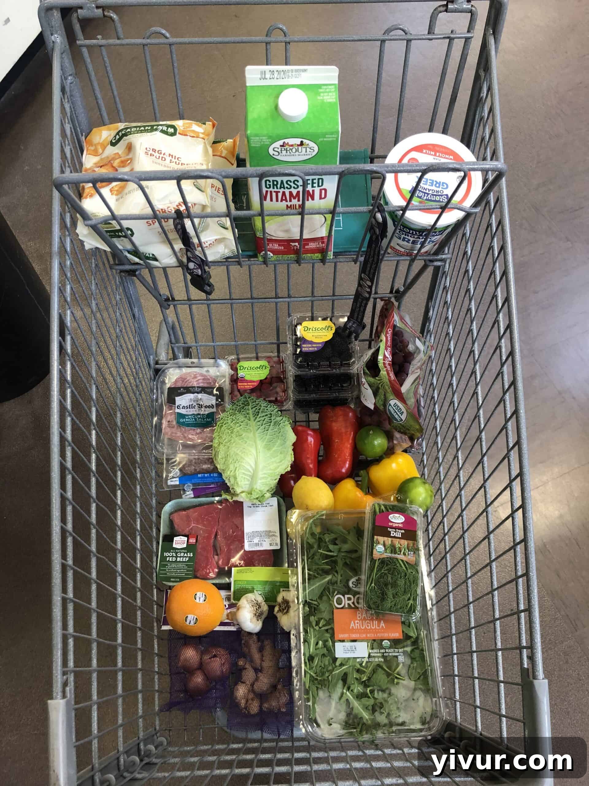 A smaller grocery haul from Sprouts, displaying fresh organic produce, herbs, and specialty keto items.