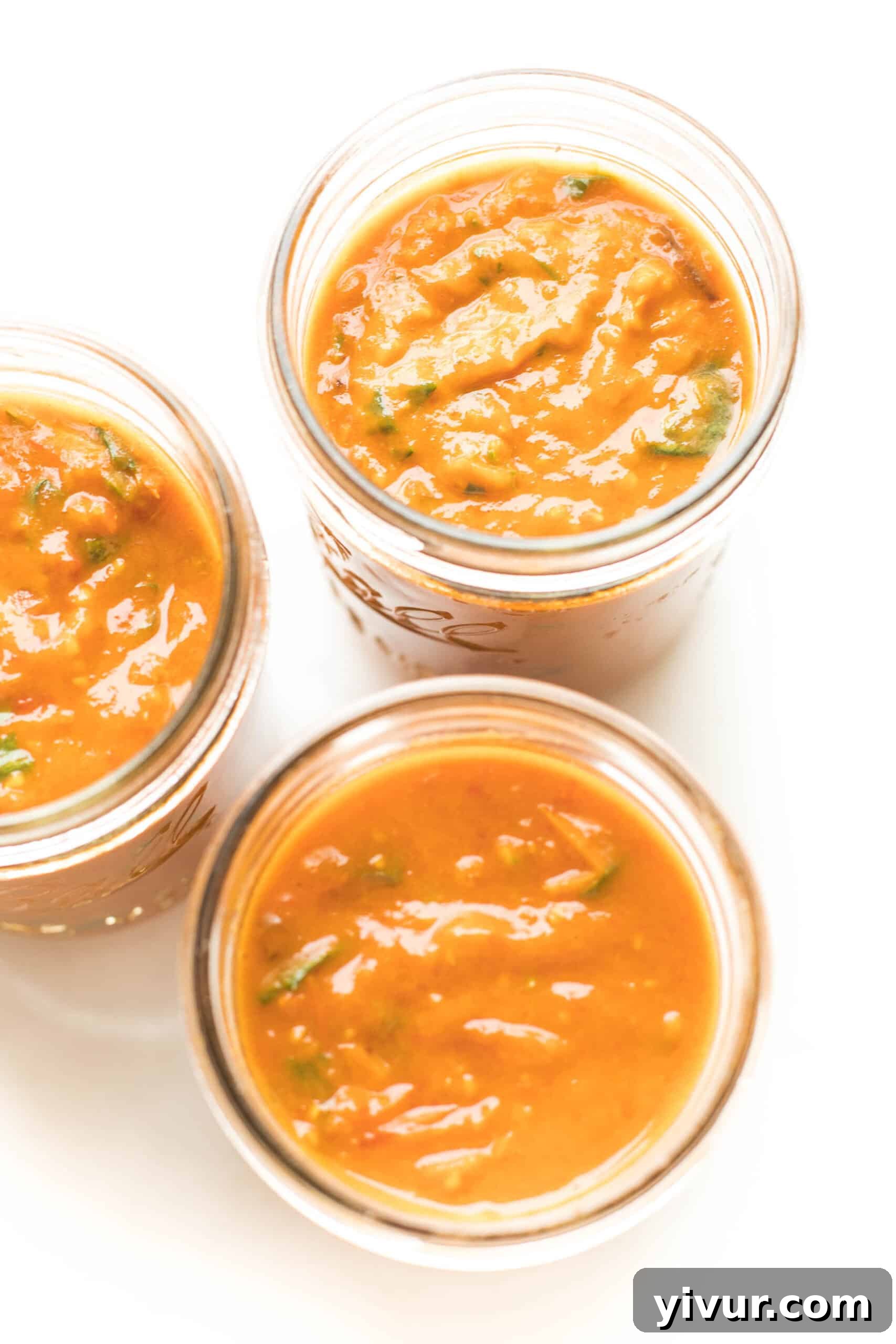 Sheet pan marinara sauce in mason jars ready for storage