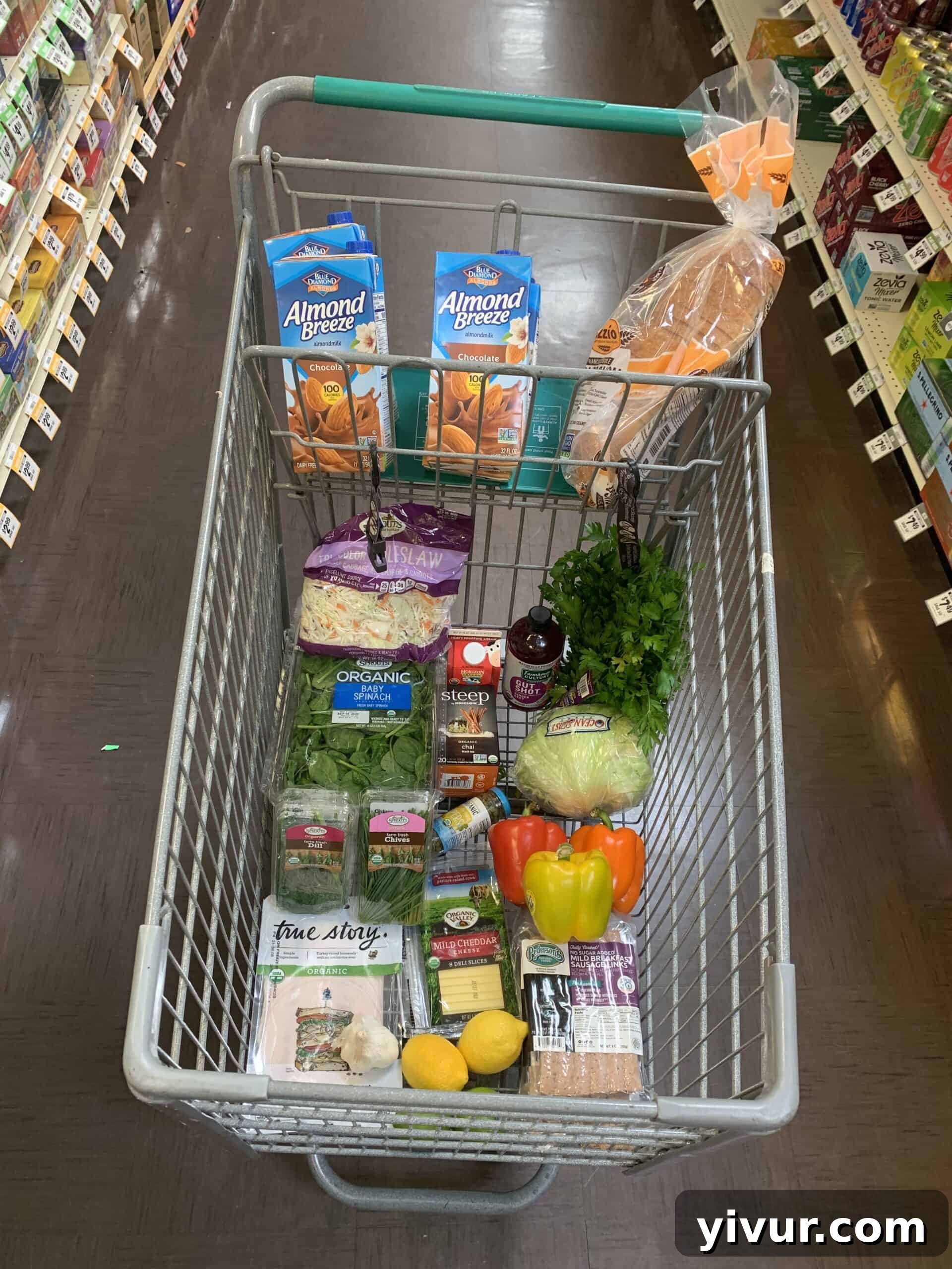 A colorful Sprouts grocery haul with fresh organic produce and specific keto and Whole30 items.