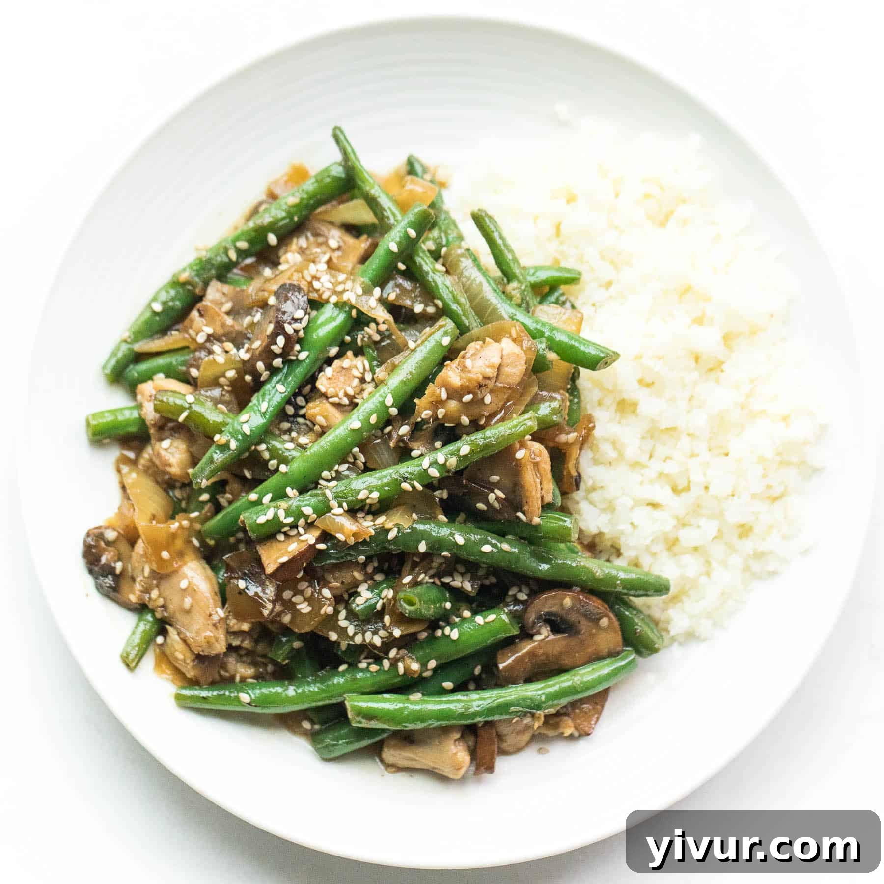 Keto + Whole30 Sesame Chicken Green Bean Stir Fry with cauliflower rice