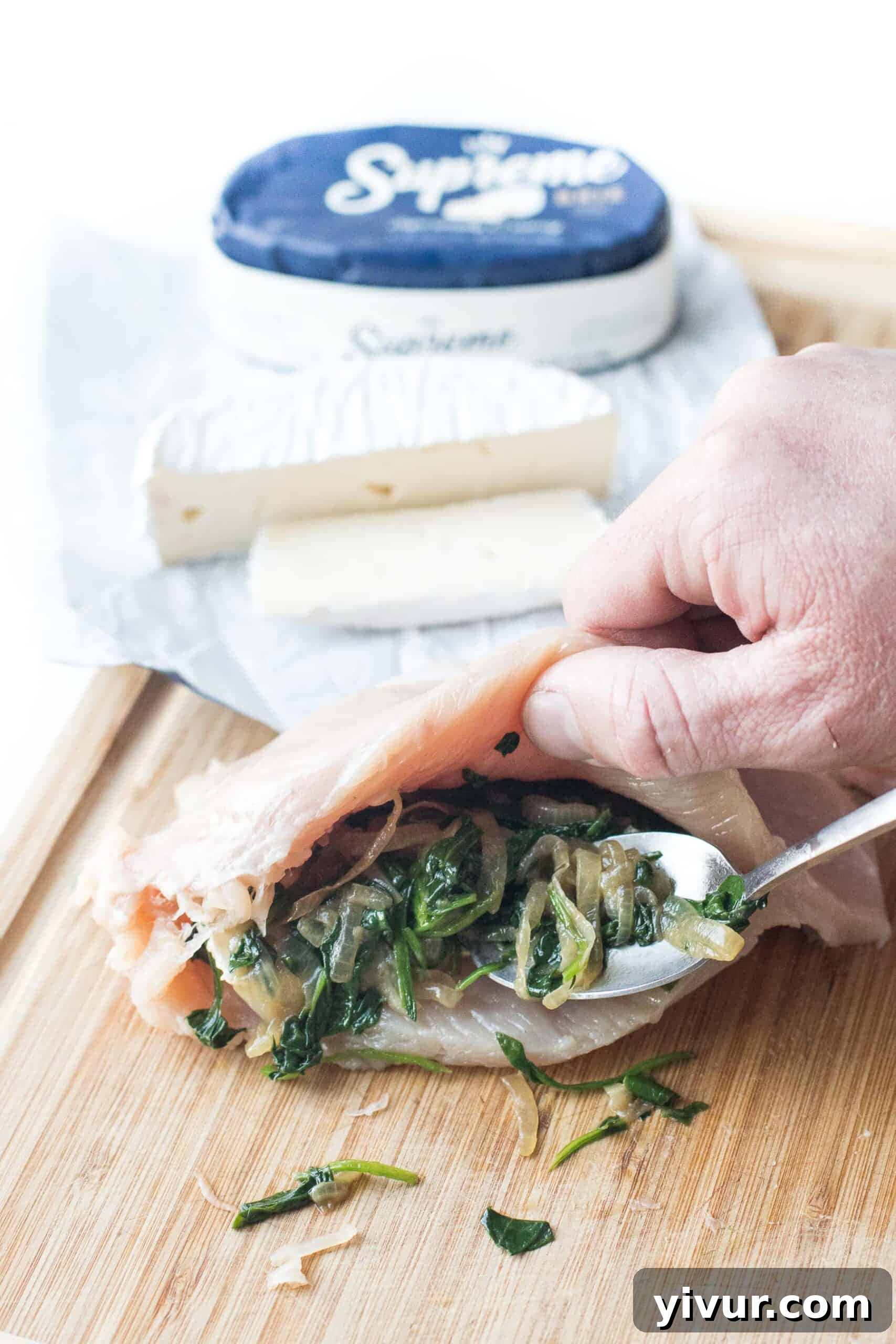 stuffing chicken breast with brie cheese and spinach