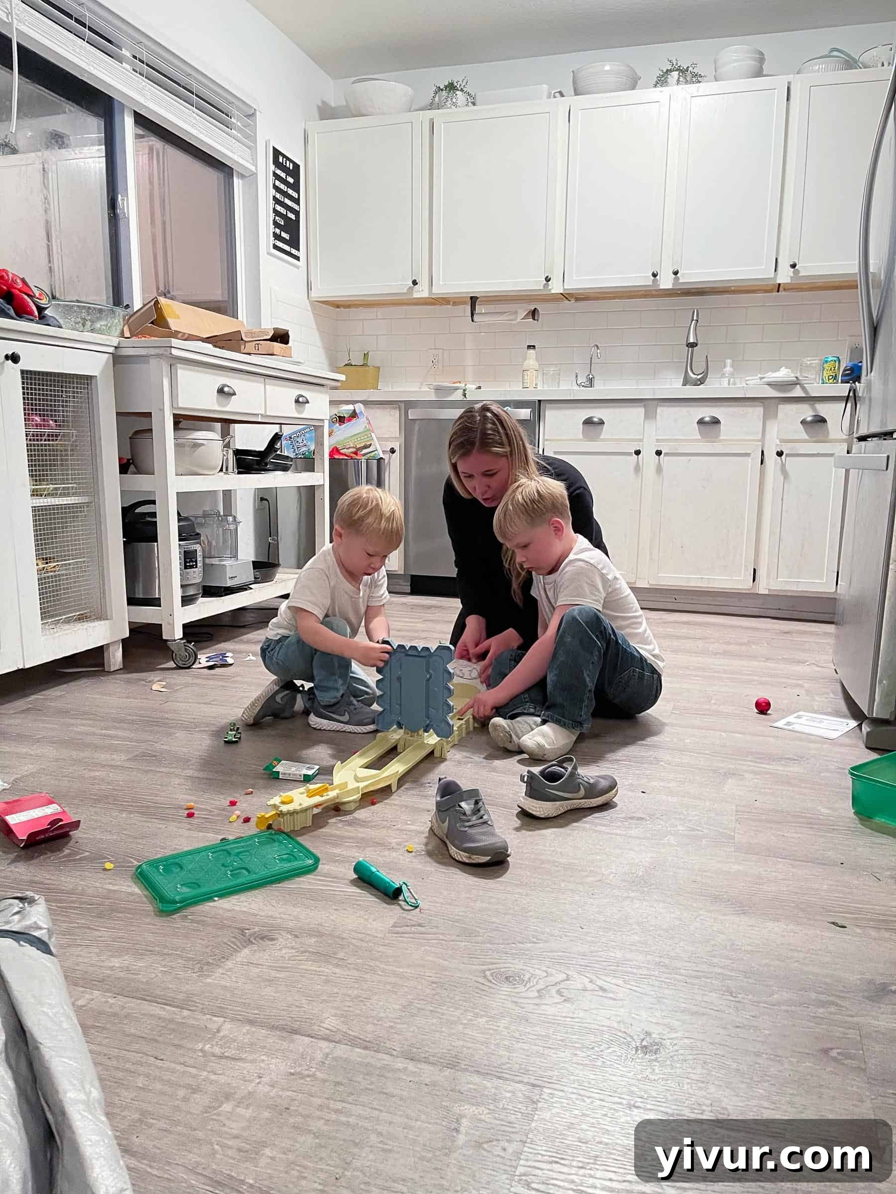 Family enjoying an early Christmas gathering with gifts and celebration