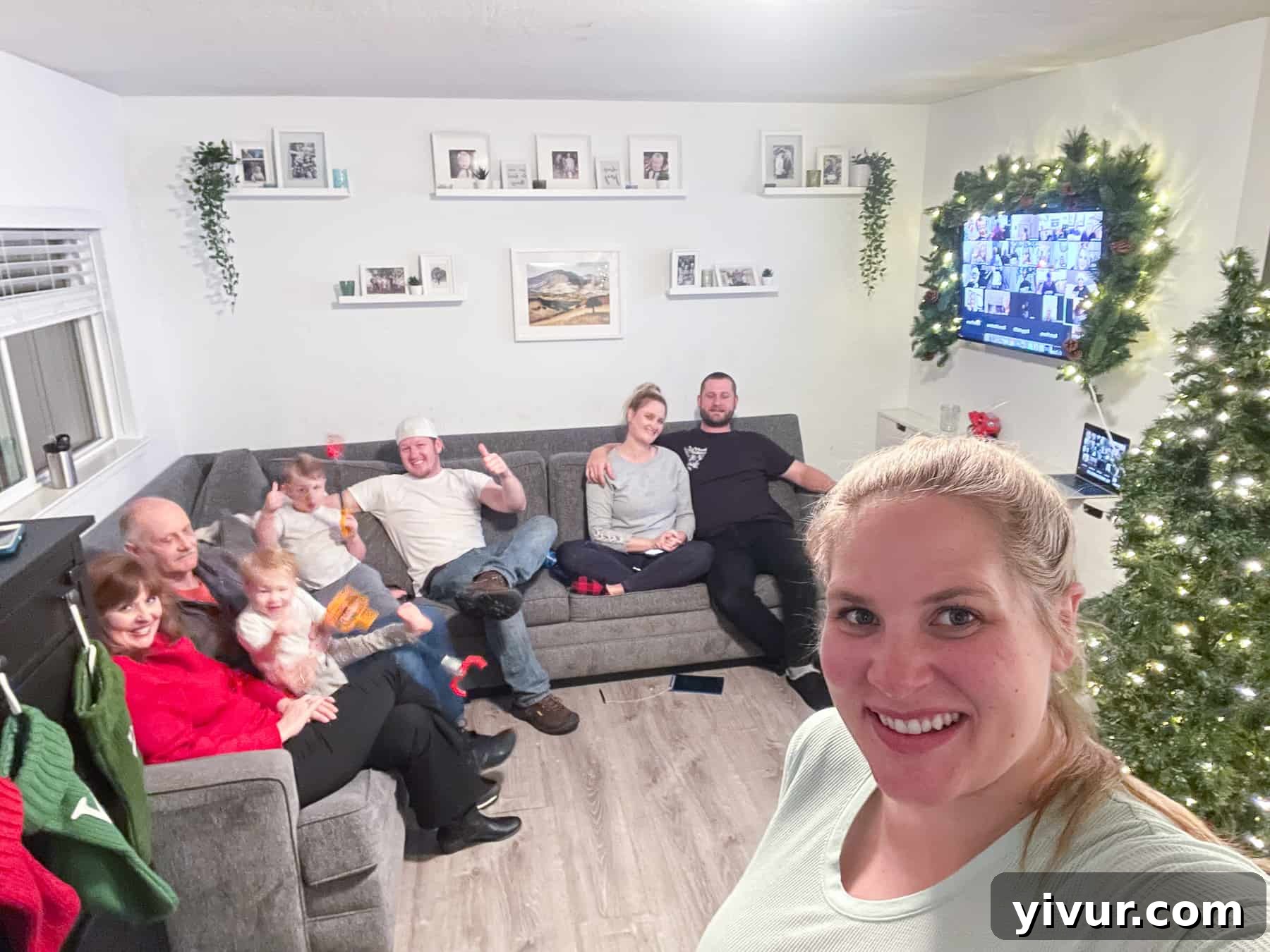 Family gathered for a virtual Christmas party via Zoom