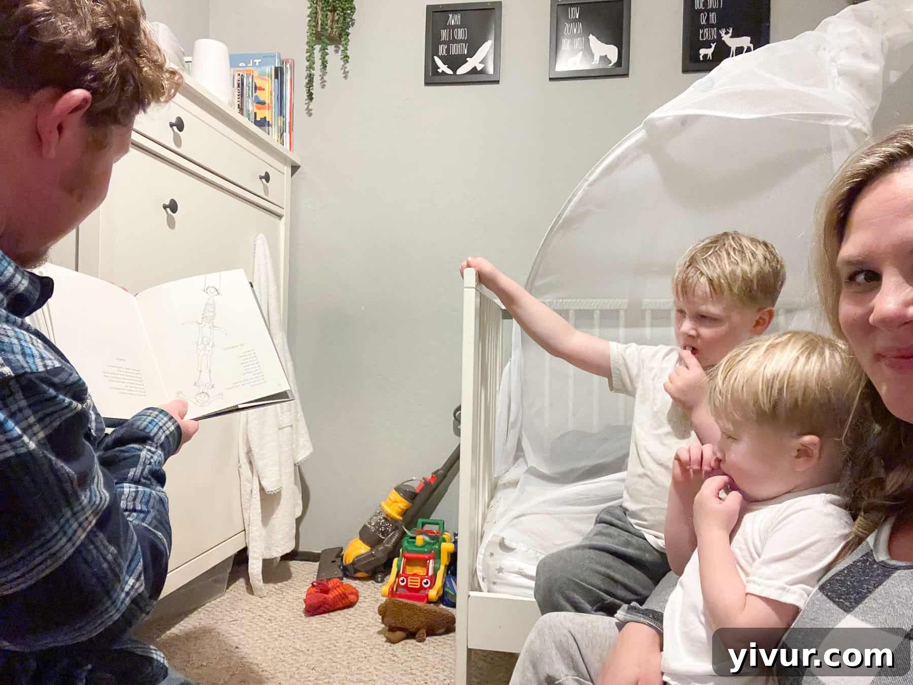 Two young boys reading a book of Shel Silverstein poems