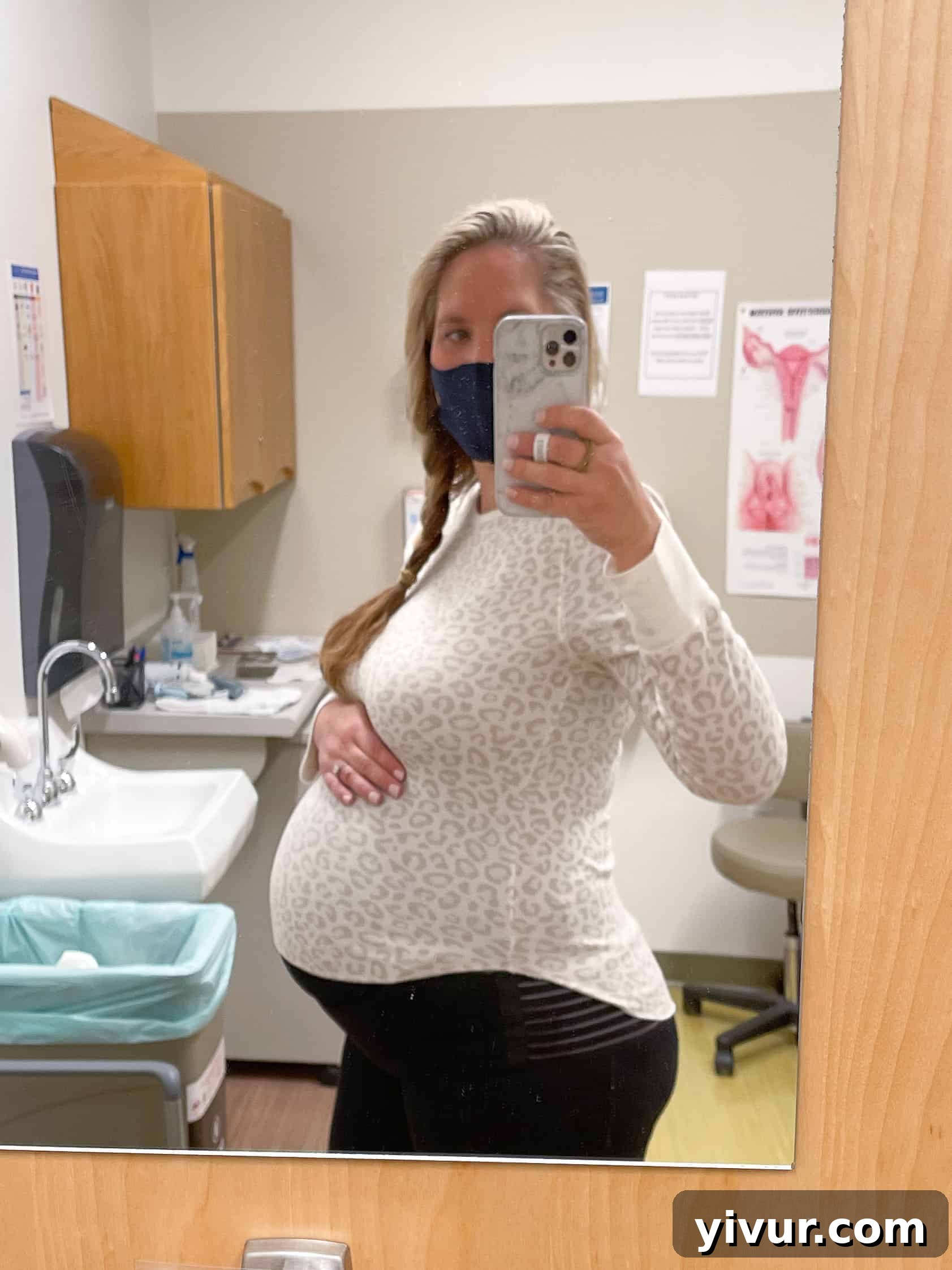 Pregnant woman at 38 weeks, showing her baby bump