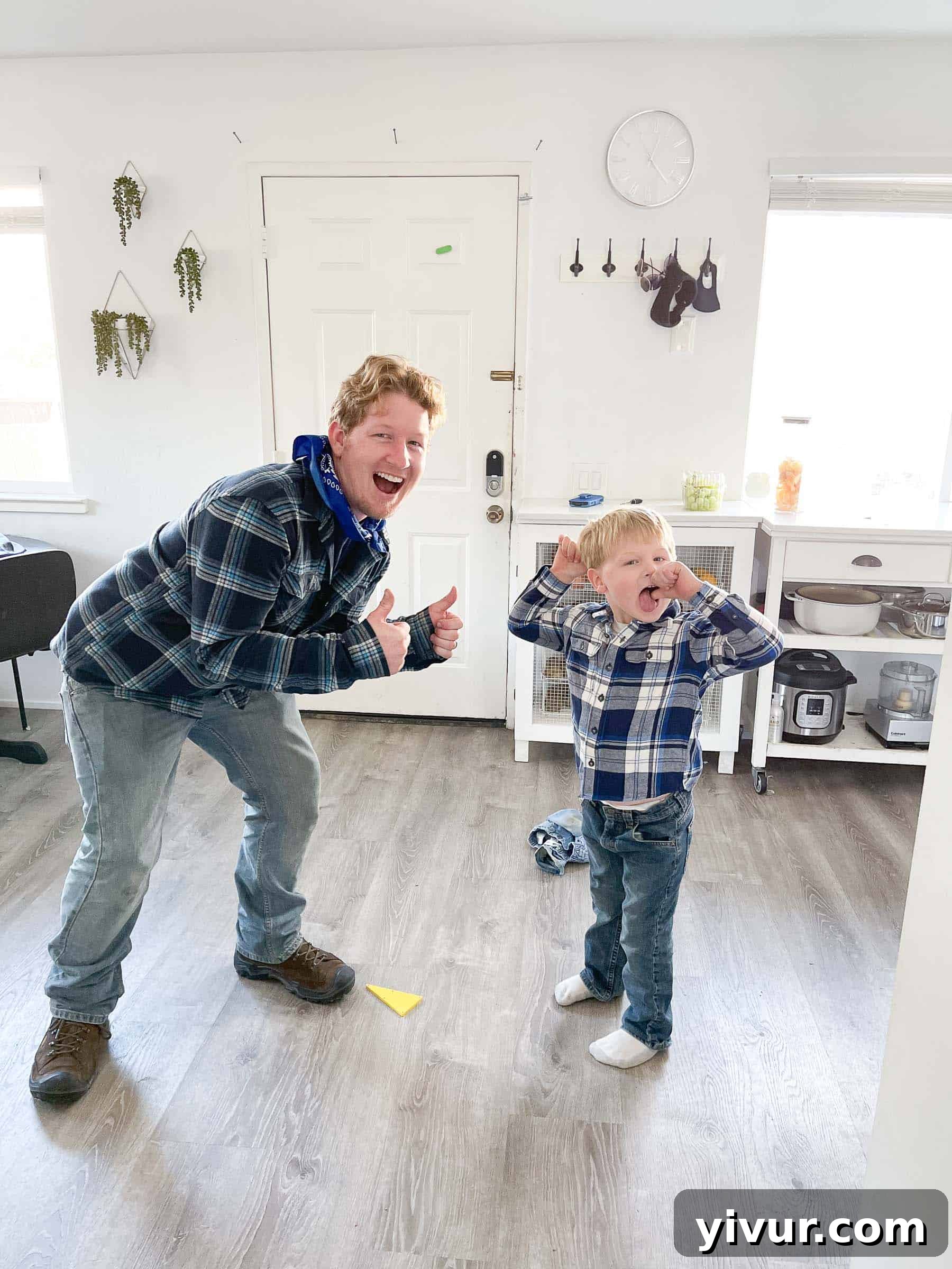 Son Josh excitedly wearing a blue flannel shirt, matching his daddy's outfit, highlighting a sweet family moment