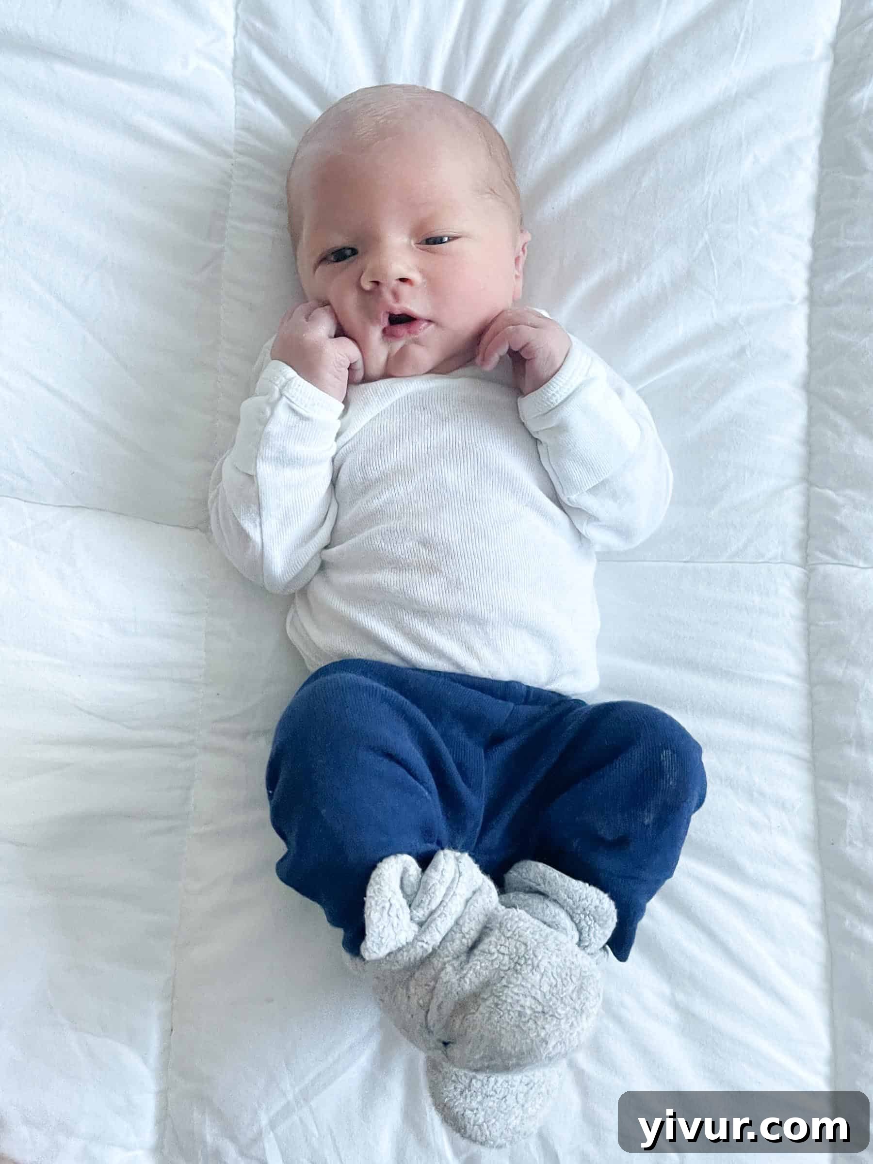 Luke sleeping soundly, perhaps in a bassinet or swaddled, a peaceful and calming image of newborn rest.