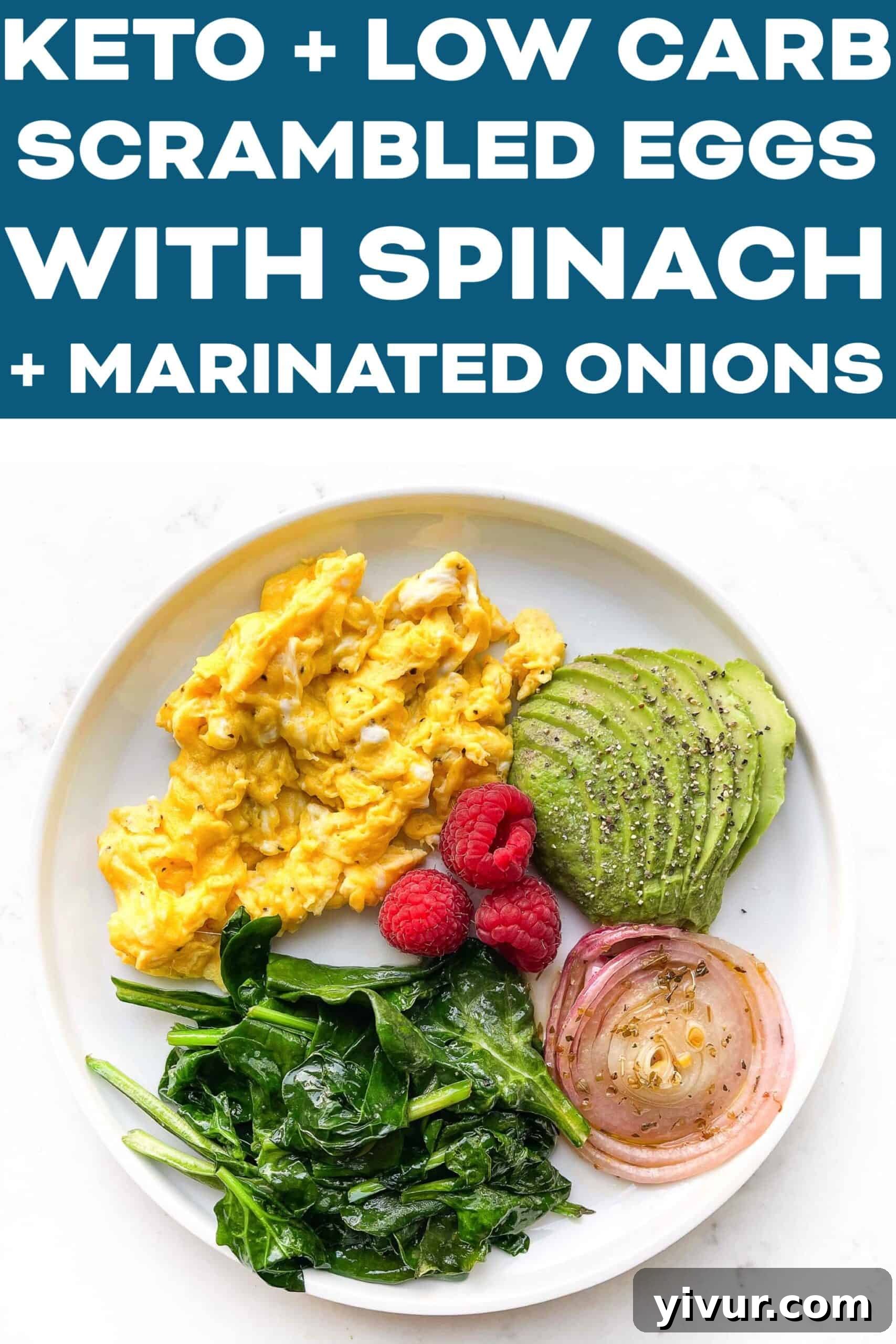 Keto Soft Scrambled Eggs with Spinach and Tangy Marinated Onions 5 A simple yet elegant serving of keto soft scrambled eggs with spinach, avocado, and marinated onions, garnished with raspberries, providing a tempting view of a healthy and fast breakfast option.
