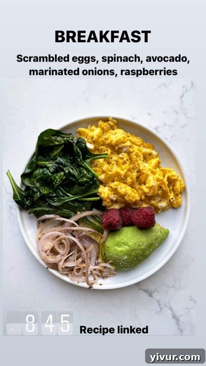 Edible March Adventures 16 Scrambled Eggs, Sauteed Spinach, Avocado, Marinated Onions, Raspberries for breakfast