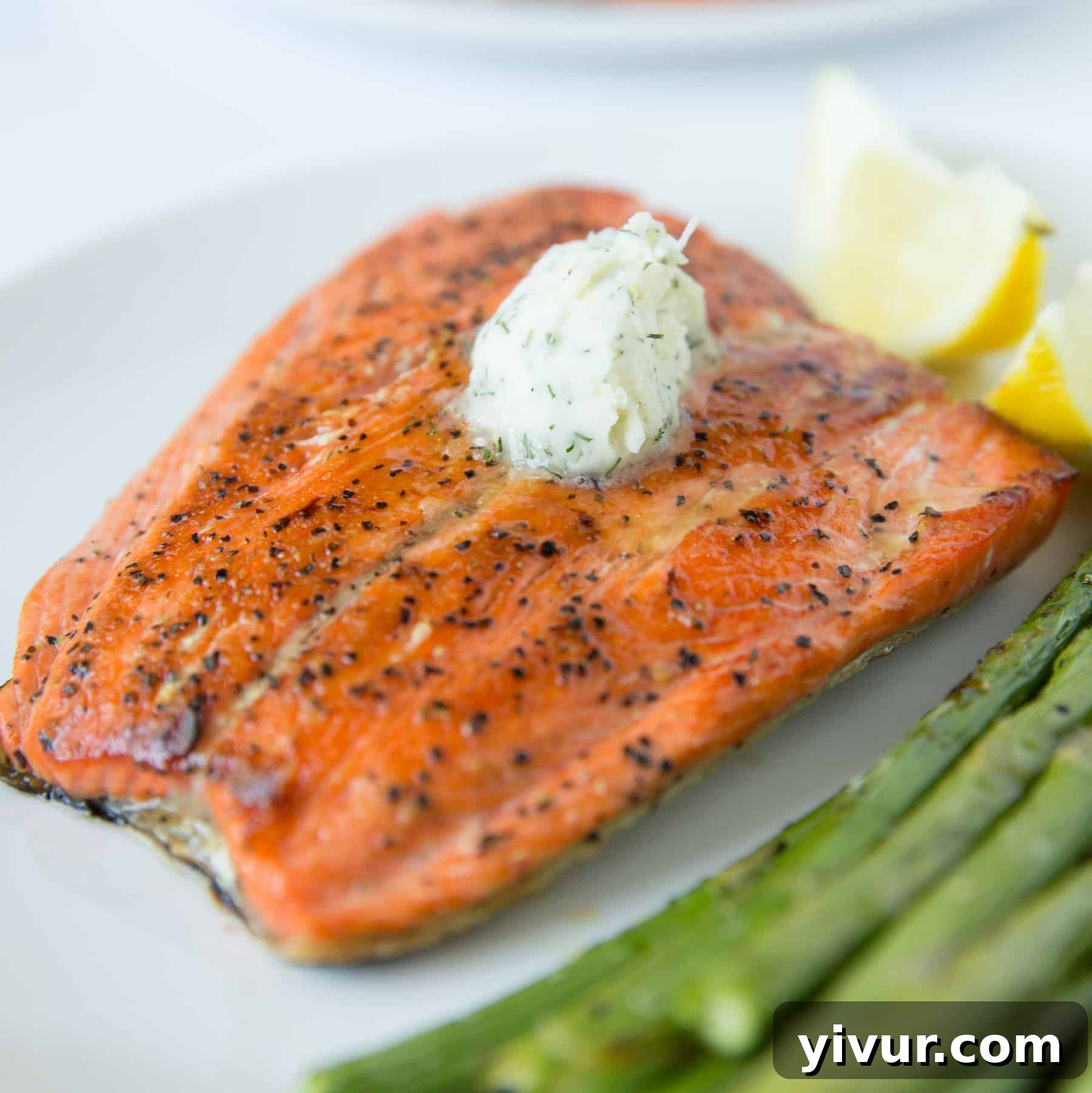Pan Seared Salmon with Dill Butter served on a plate