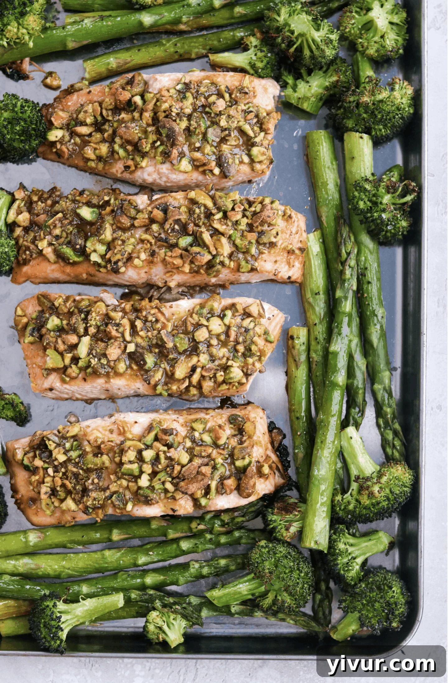 Maple Dijon Pistachio Crusted Salmon with Spring Veggies served on a plate