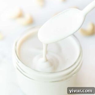 Keto Cashew Cream in a bowl with a spoon