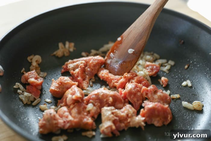 Cooked sausage with onions