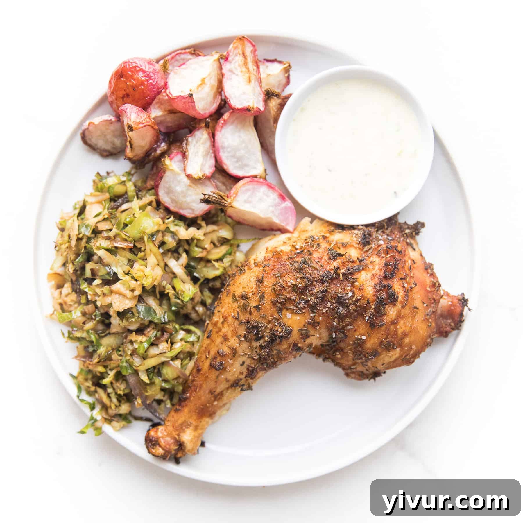 A whole spatchcocked chicken, expertly grilled and blackened to perfection, suitable for keto and Whole30.