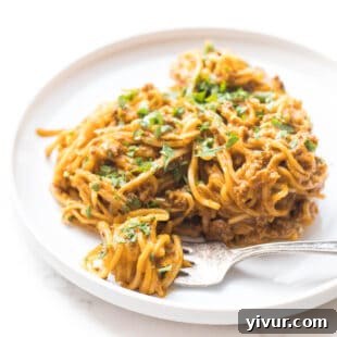 Whole30 and Keto spaghetti with rich meat sauce on a plate.