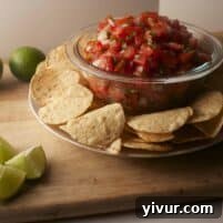 Vibrant Salsa Fresca 2 Classic Fresh Pico de Gallo served with tortilla chips.