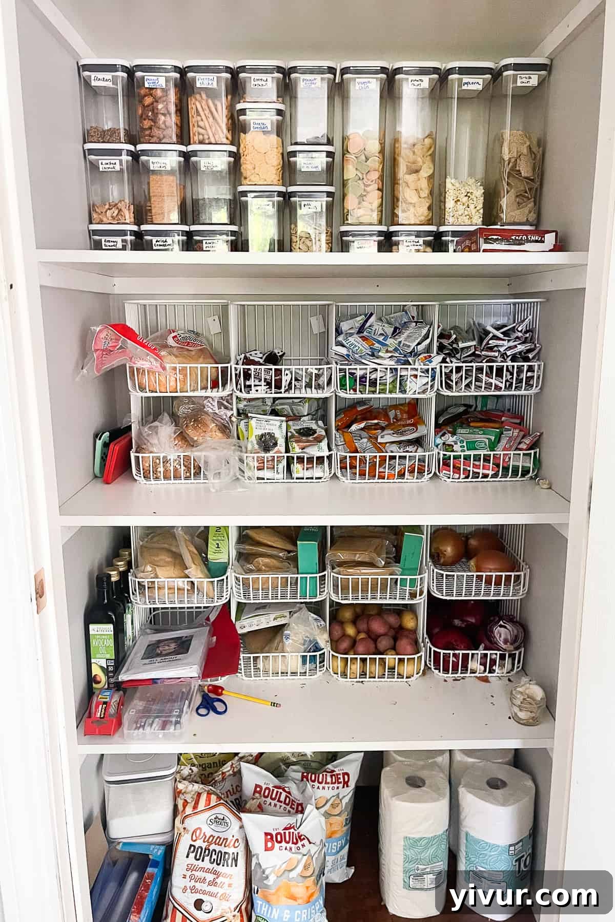 Beautifully organized pantry featuring various containers and storage baskets