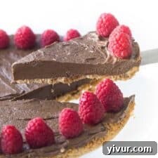 Lifting a slice of healthy chocolate tart