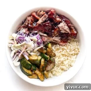 Make Dad's Day Delicious: Keto Recipes and Gift Ideas for Fathers Day 2022 11 Keto BBQ pulled pork served in a bowl with healthy sides.