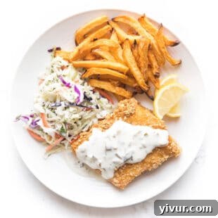Make Dad's Day Delicious: Keto Recipes and Gift Ideas for Fathers Day 2022 12 fish + chips with coleslaw + tartar sauce on a white plate