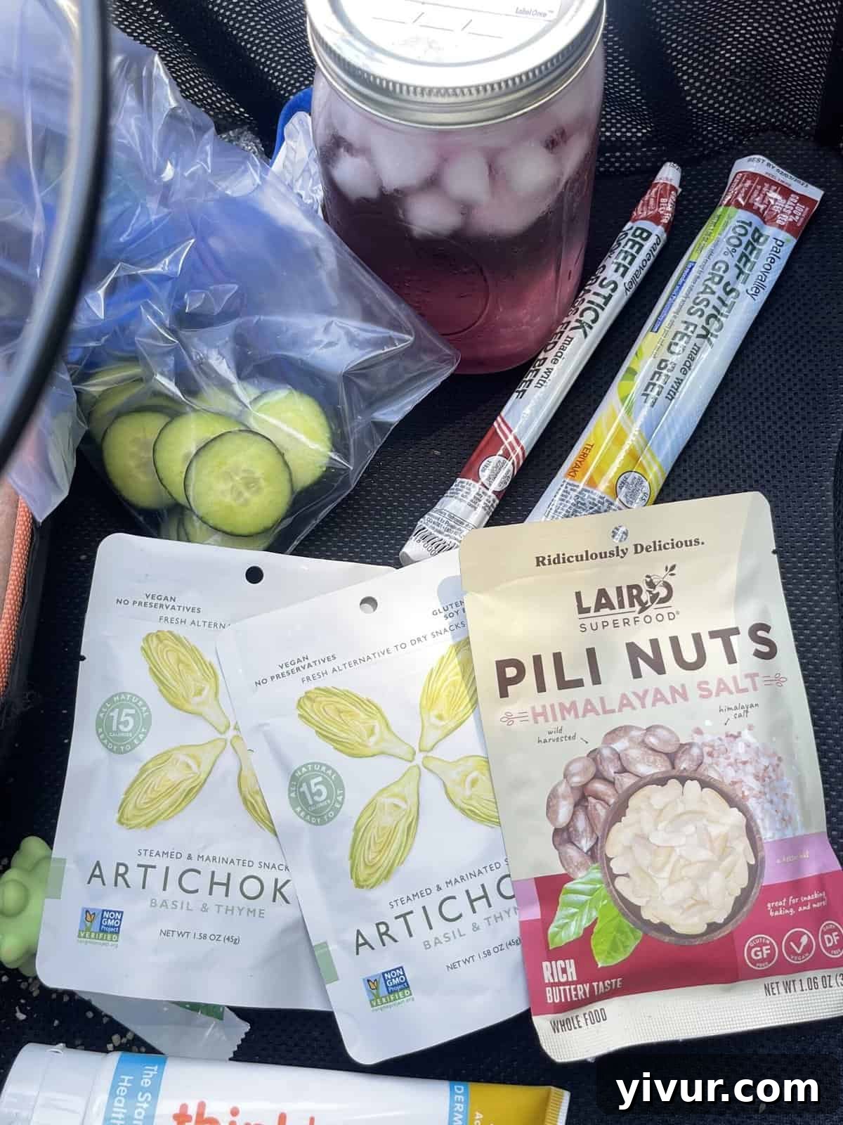 Make Dad's Day Delicious: Keto Recipes and Gift Ideas for Fathers Day 2022 3 A colorful array of various keto-friendly snack products arranged in a gift basket.