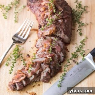 Make Dad's Day Delicious: Keto Recipes and Gift Ideas for Fathers Day 2022 5 Grilled tri-tip steak, sliced and served, showcasing its juicy interior.