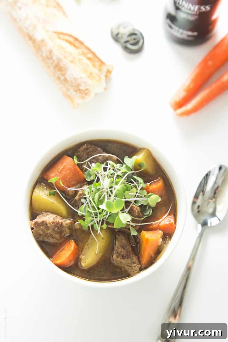 Slow Cooker Irish Guinness Beef Stew with a pint of Guinness beer